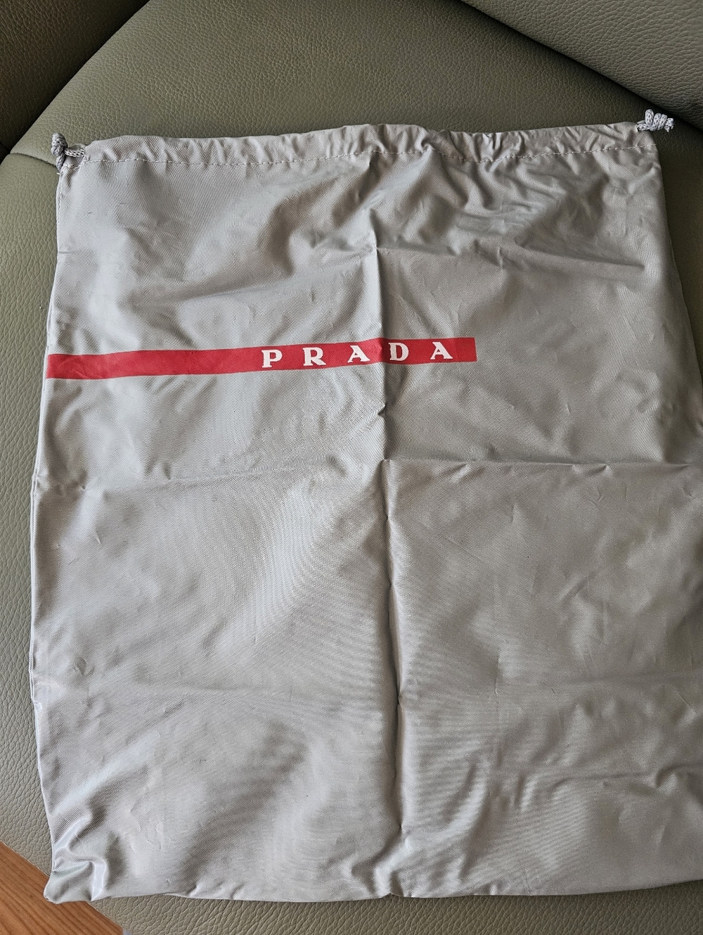 Prada Drawstring Dust Bag in Light Gray with Red Logo